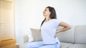 woman suffering from backache ho