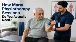 Older man doing arm exercises during physiotherapy sessions with a physiotherapist